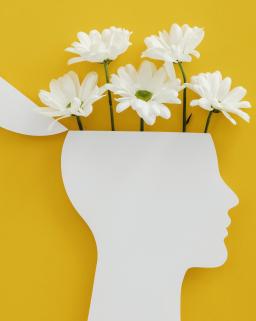 Tête humaine et fleurs